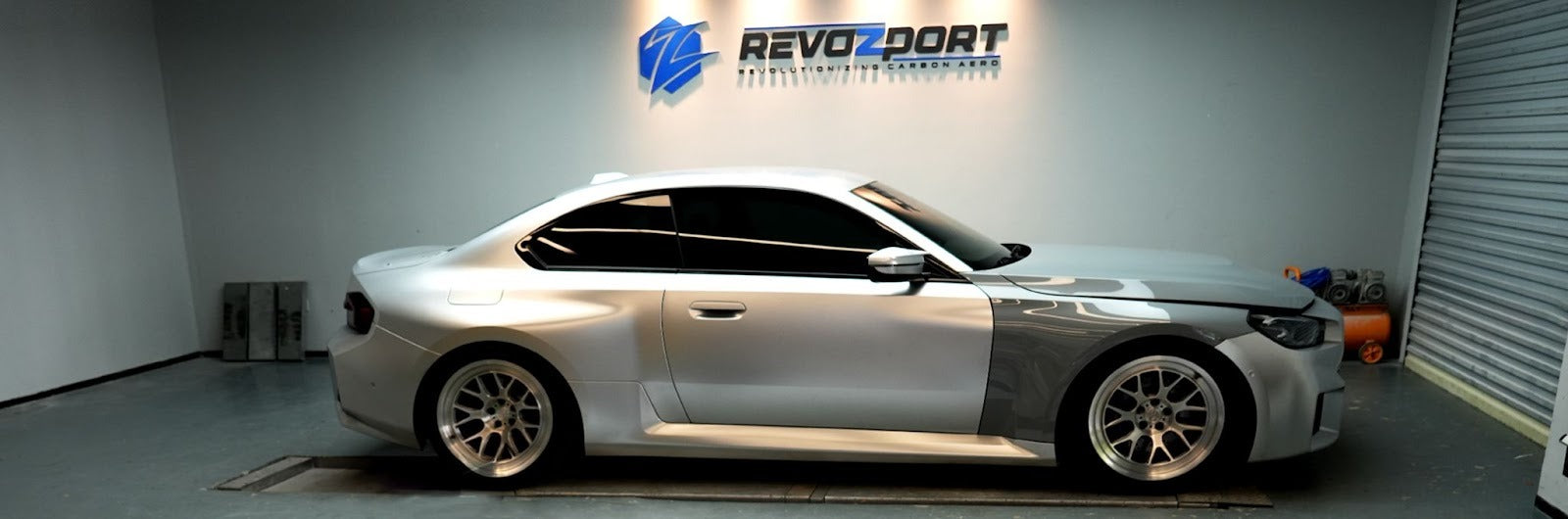 revozport car showing carbon fiber fender