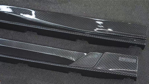 REVOZPORT glossy carbon fiber body kit components displayed before installation, including front lip sections, side skirts, rear diffuser, and aero trim pieces.