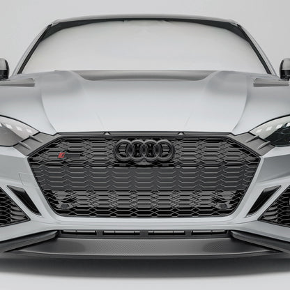 Audi car with a carbon fiber grille on a white background