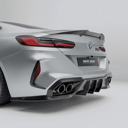 BMW M8 F92  with a carbon fiber rear diffuser on a white background