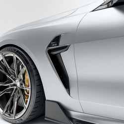 BMW M8 F92  with a carbon fiber vent close-up on a white background