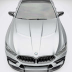 bmw-m8-f92--with-a-carbon-fiber-hood-close-up-on-a-white-background