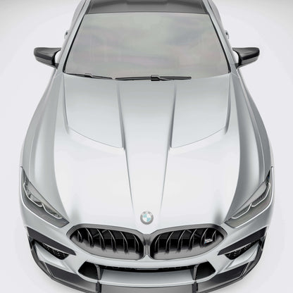 BMW M8 F92  with a carbon fiber hood close-up on a white background
