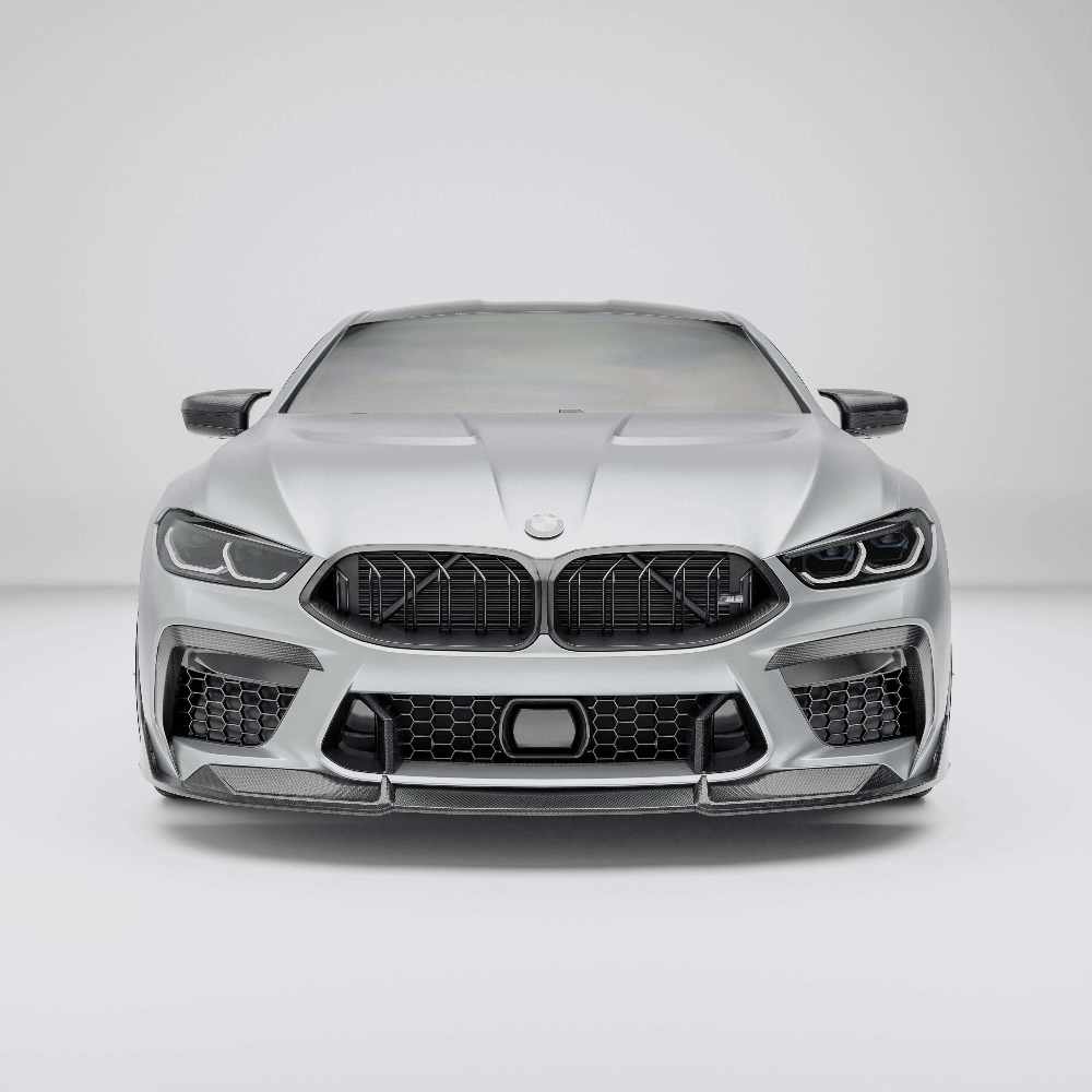 BMW M8 F92  with a carbon fiber grille on a white background