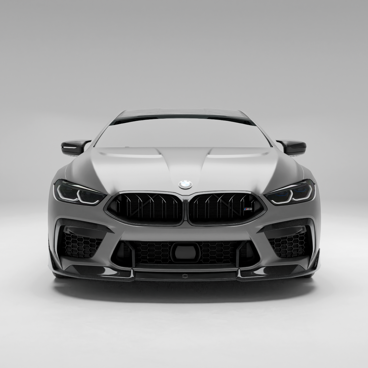 BMW car with a carbon fiber rair intake trim on a white background
