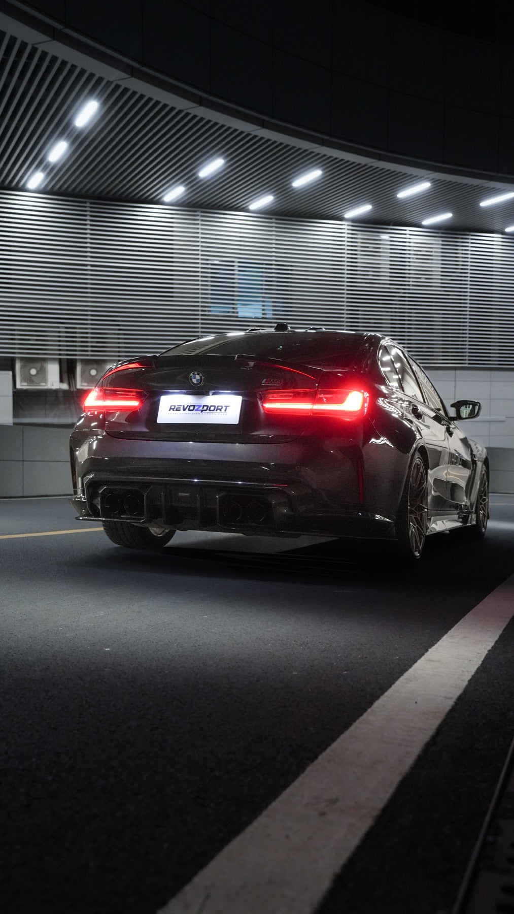 BMW M3 G80 Street Program official BMW dealer rear diffuser night