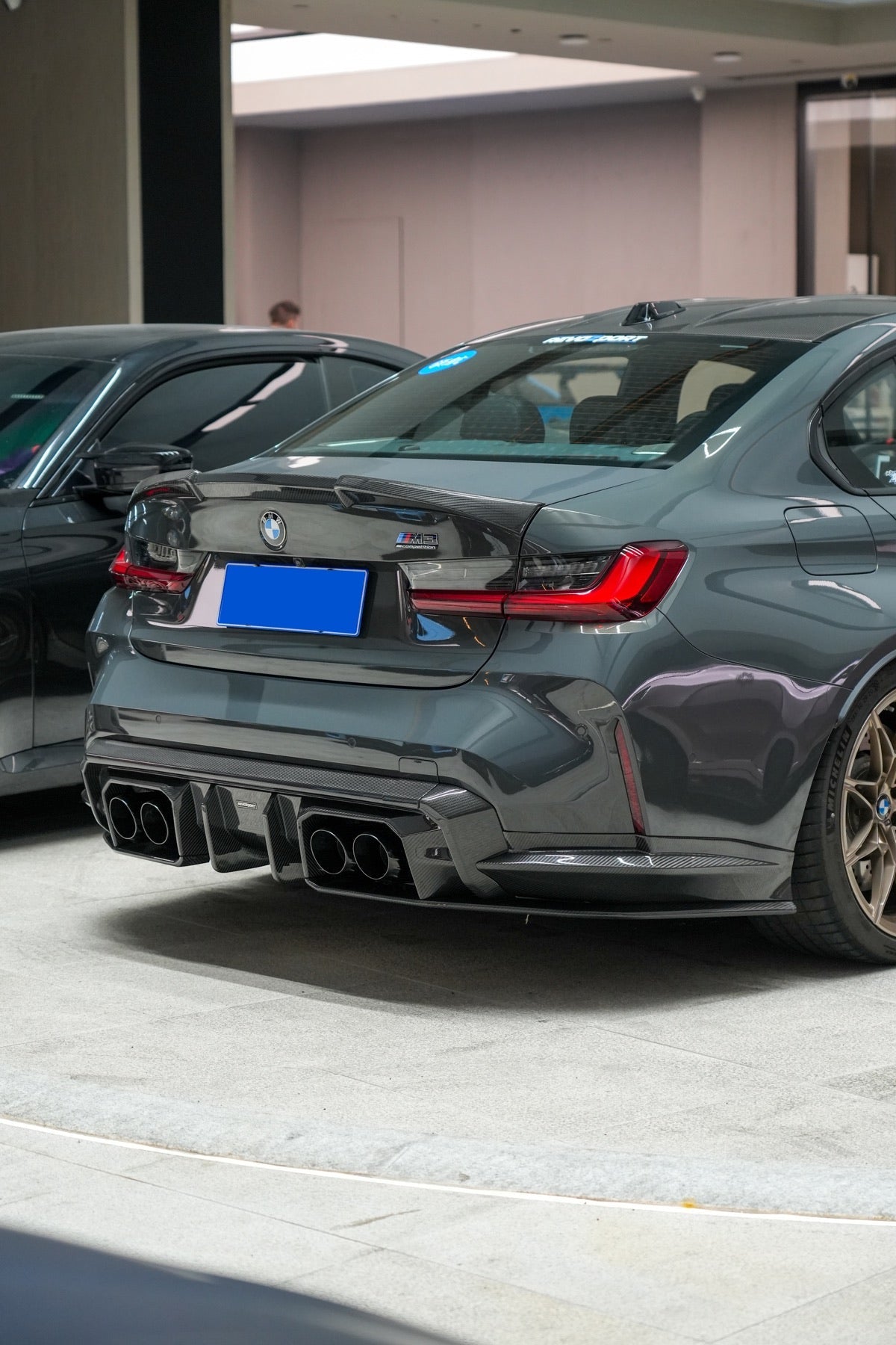 BMW M3 G80 Street Program official BMW dealer rear diffuser showroom