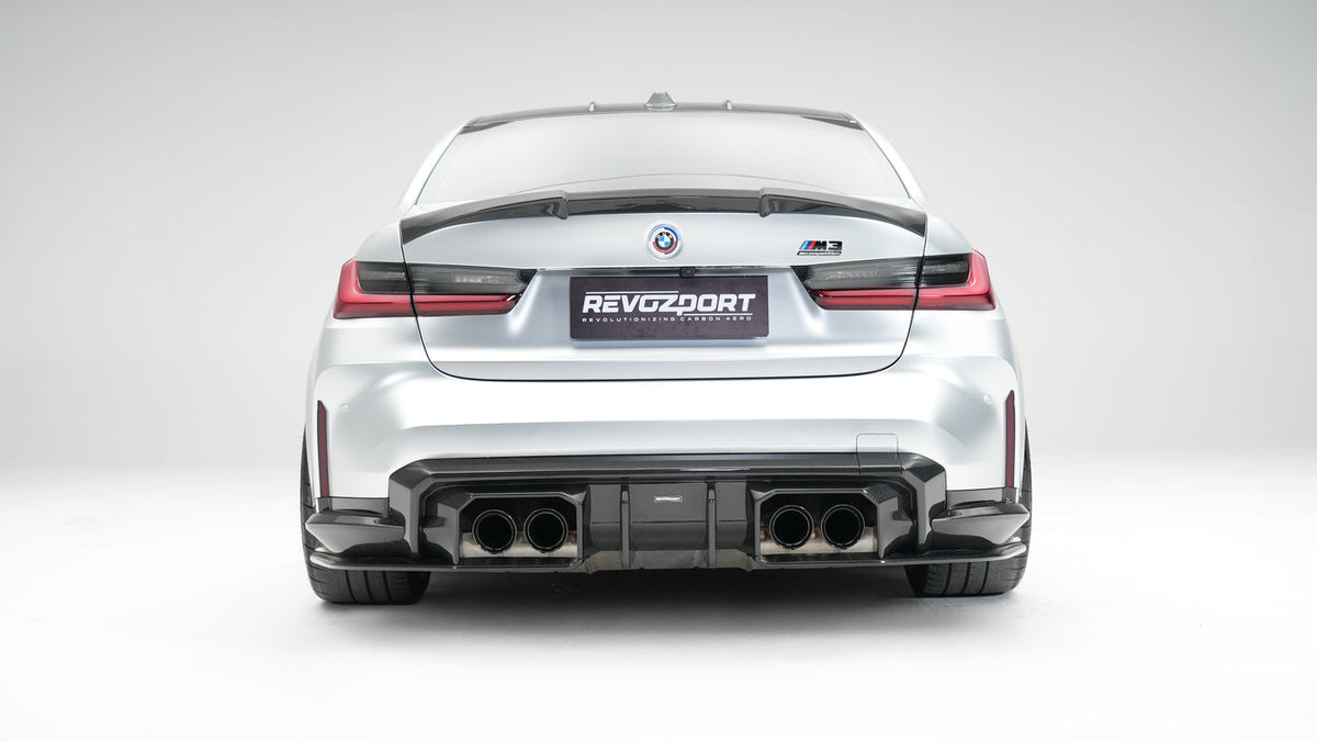 BMW M3 G80 Street Program silver rear view with RevoZport rear diffuser and trunk spoiler