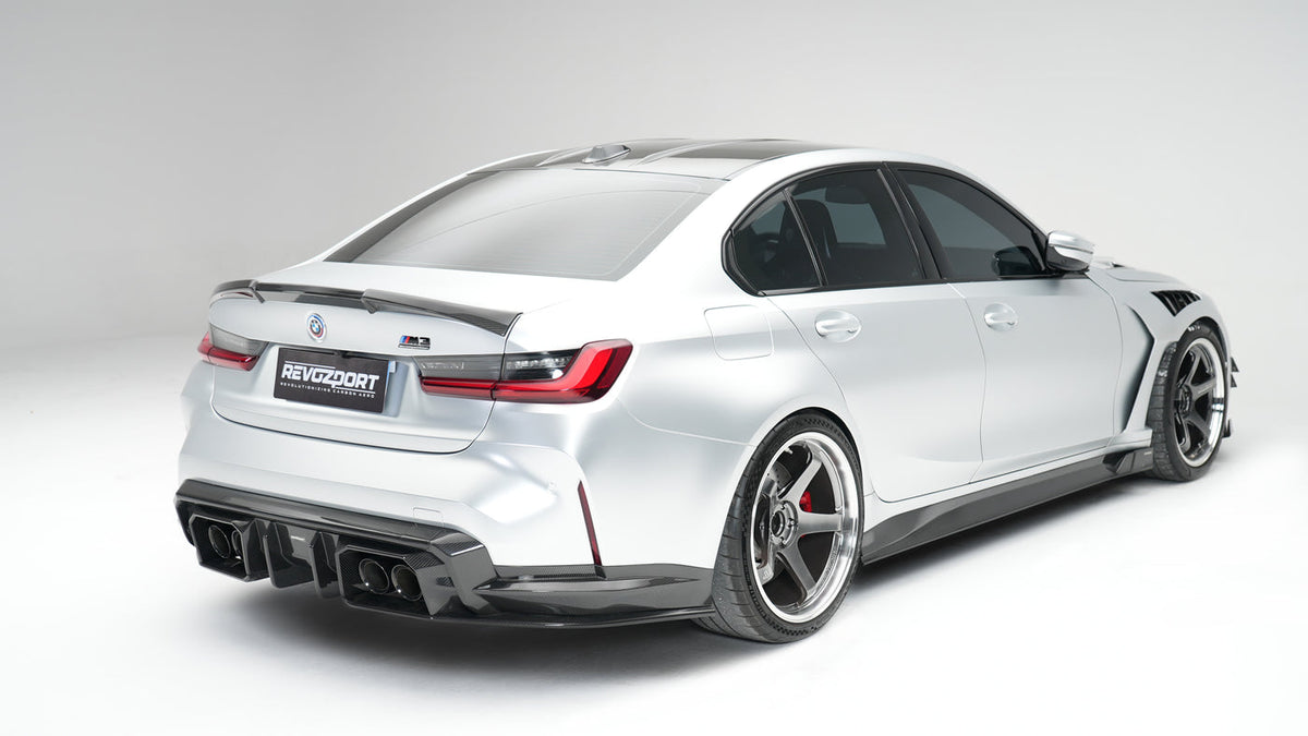 BMW M3 G80 Street Program silver rear side with RevoZport rear diffuser trunk spoiler fenders and side skirts