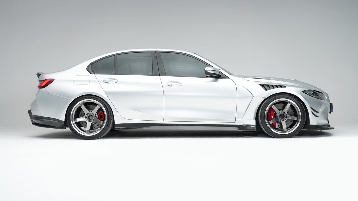 BMW M3 G80 Street Program silver side profile with RevoZport front lip front vents hood fenders and side skirts